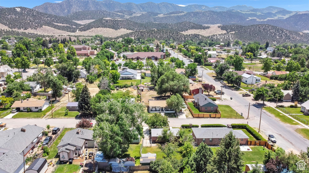 Aerial view of residential area with mountains