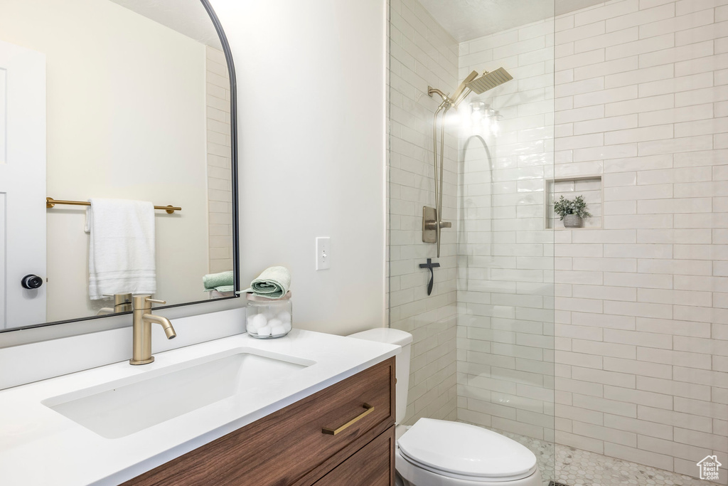 Bathroom with vanity and walk in shower