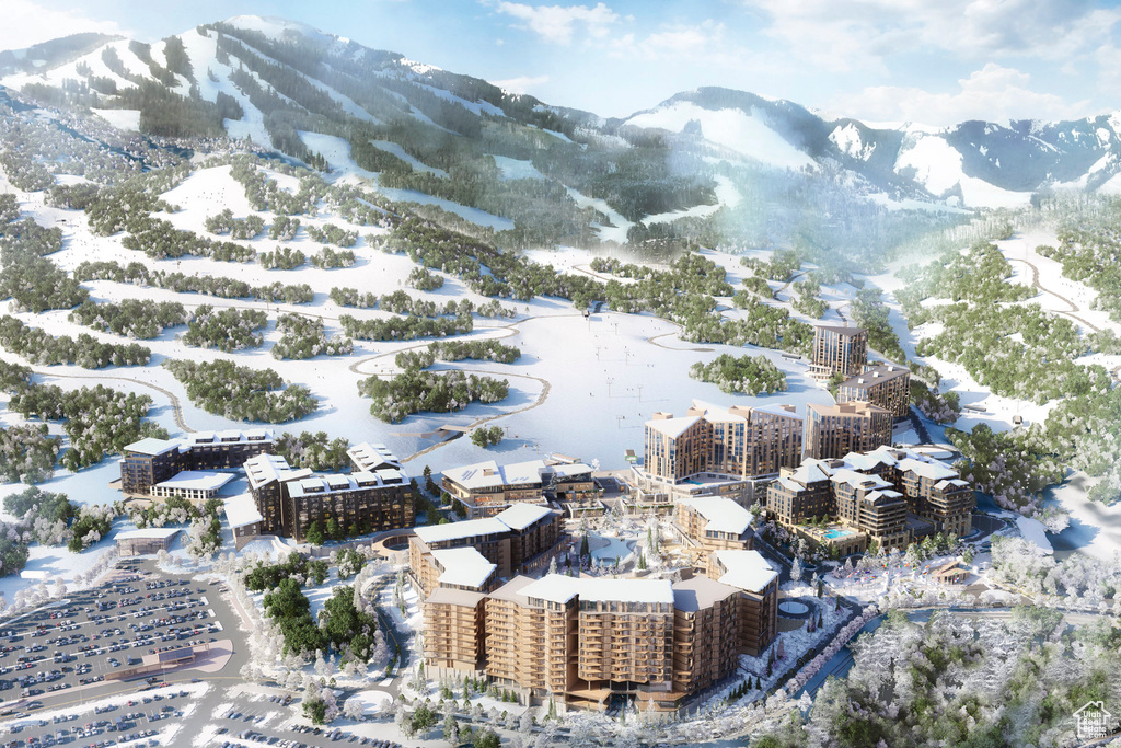 Snowy aerial view with a mountain view