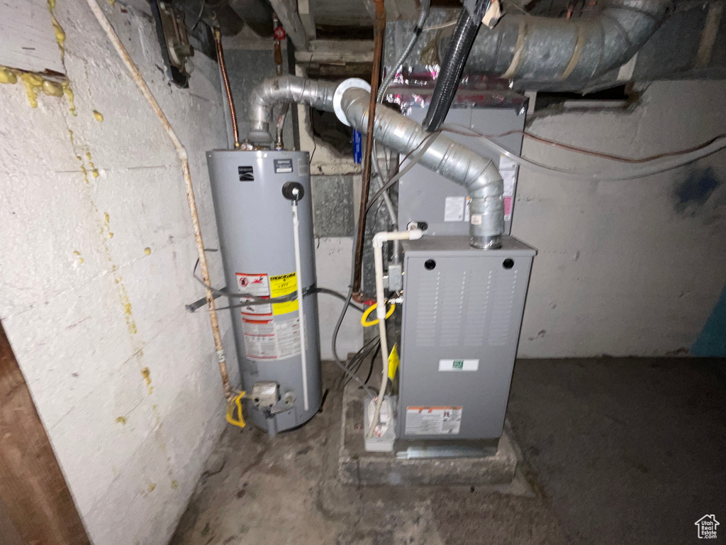 Utility room with gas water heater