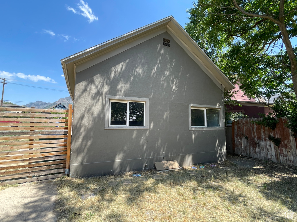 View of property exterior with stucco siding