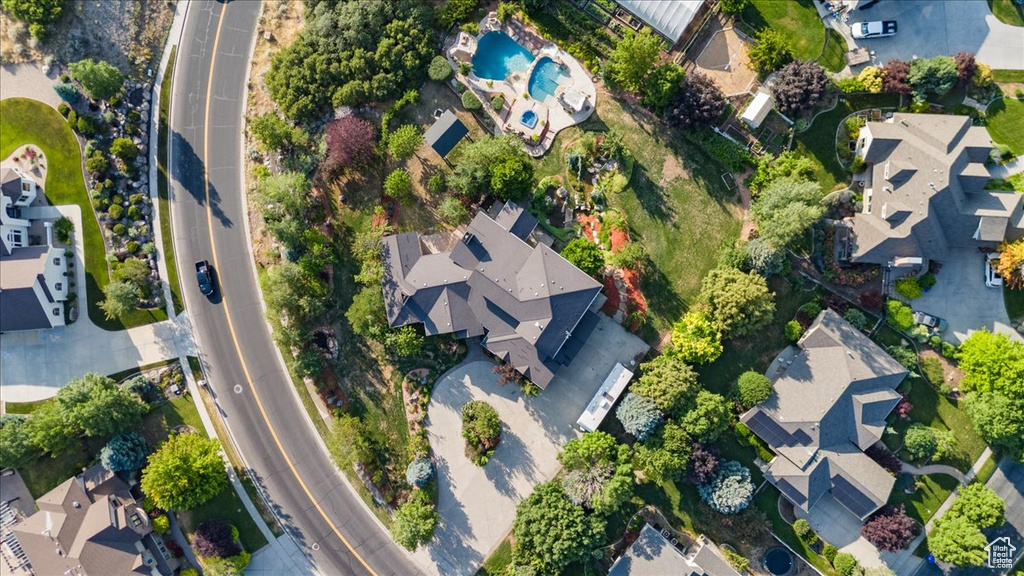 View of property location with nearby suburban area
