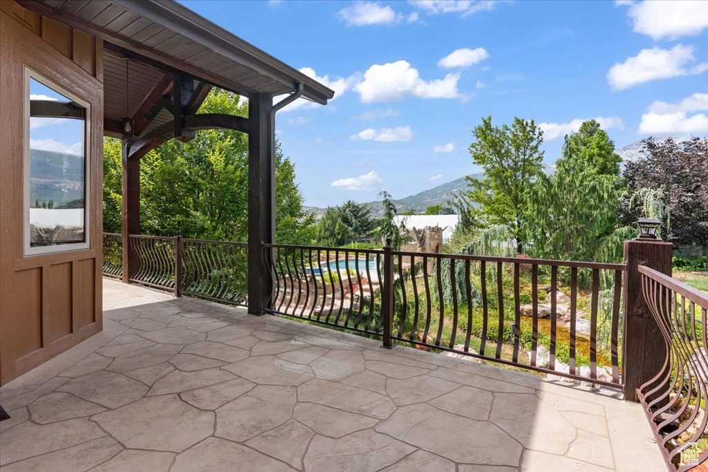 View of patio / terrace featuring a mountain view