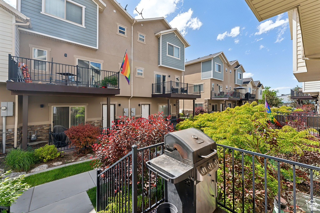 Balcony featuring a residential view