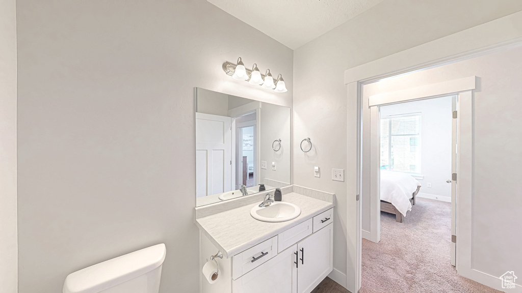 Bathroom with connected bathroom and vanity