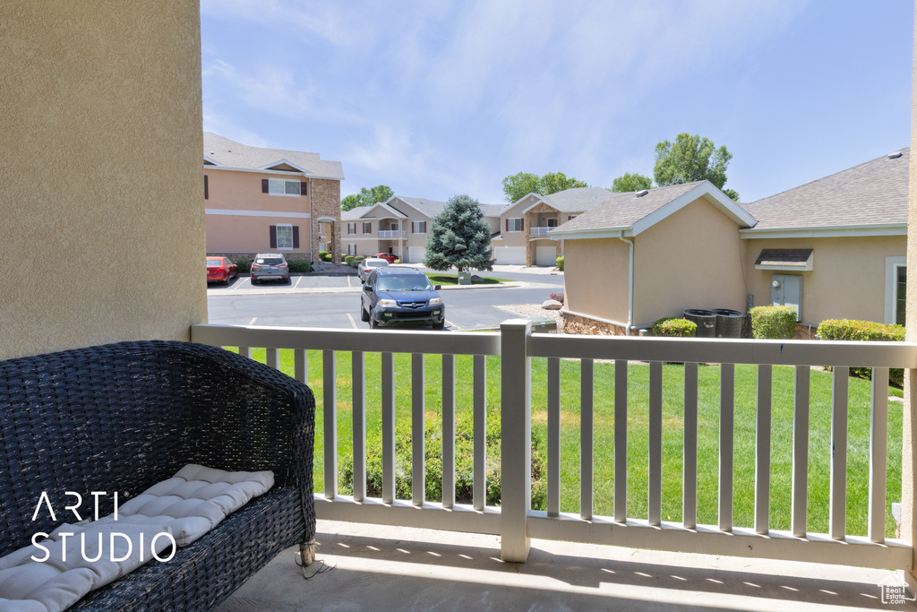 Balcony featuring a residential view