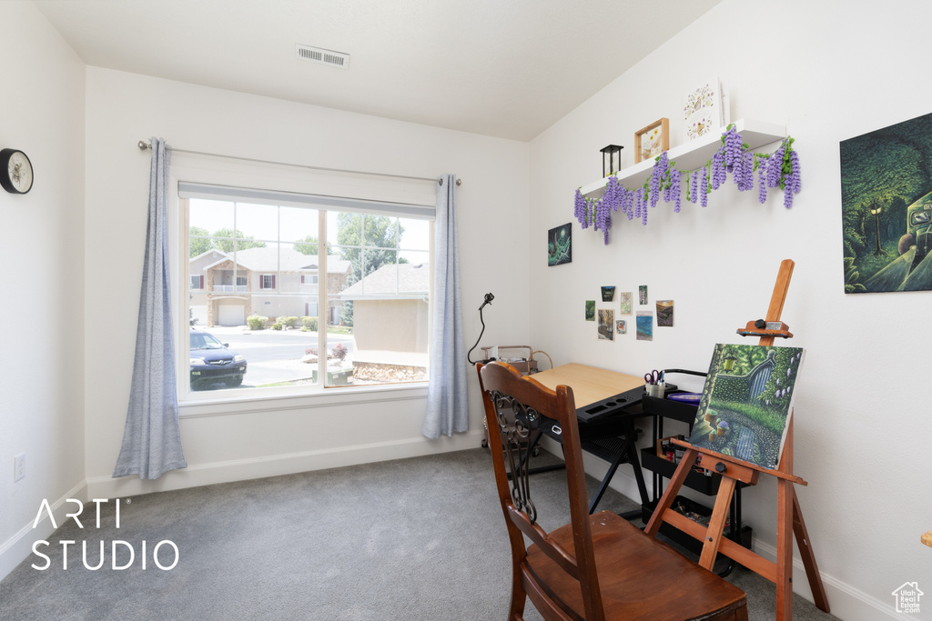 Office space featuring carpet flooring and baseboards
