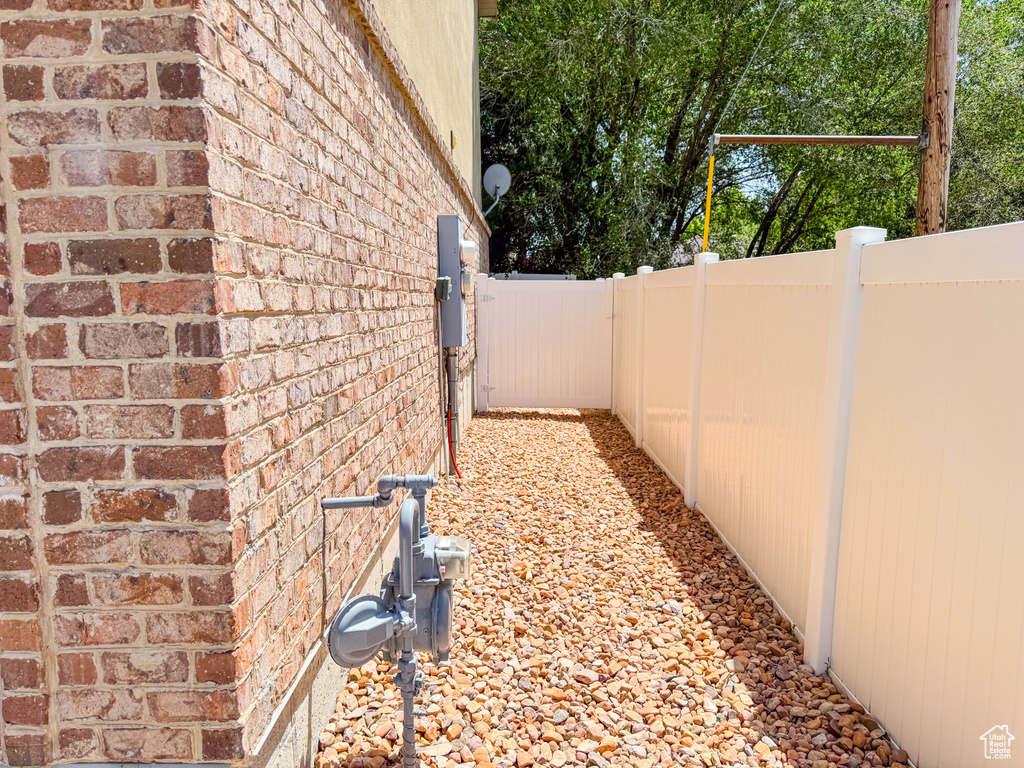 View of side of property with brick siding