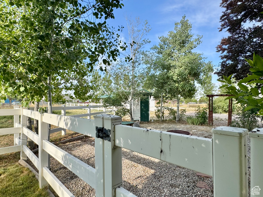 Fenced yard featuring a gate