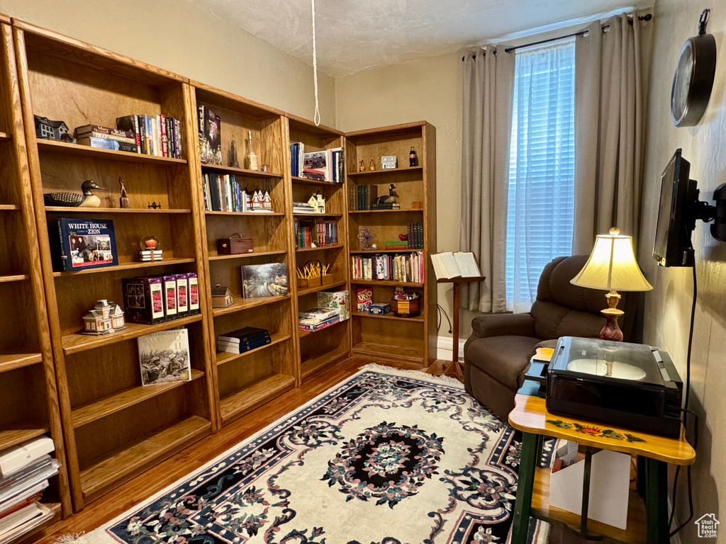 Living area with wood finished floors