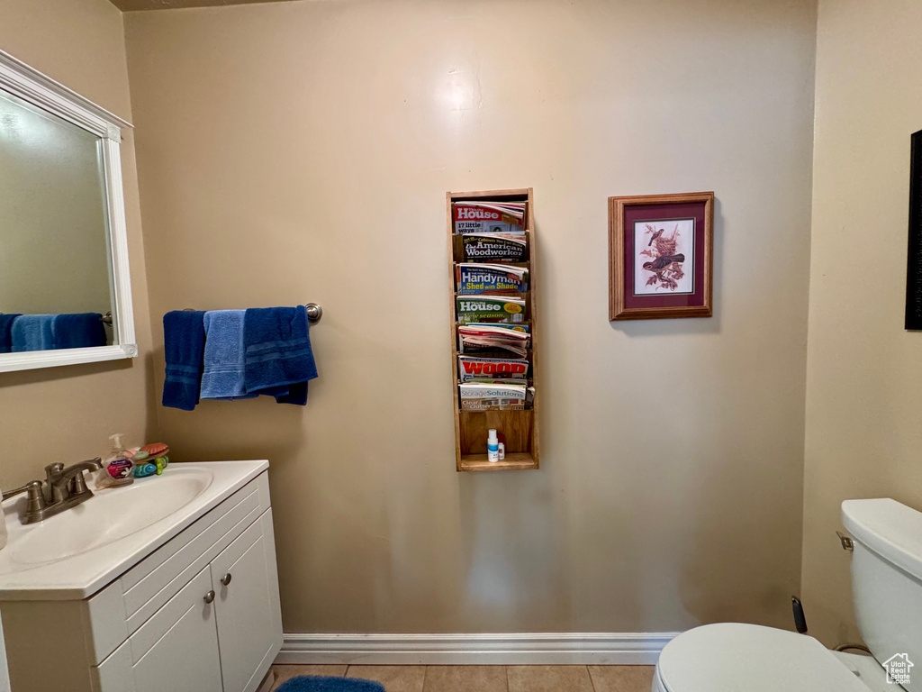 Bathroom featuring vanity and tile patterned floors