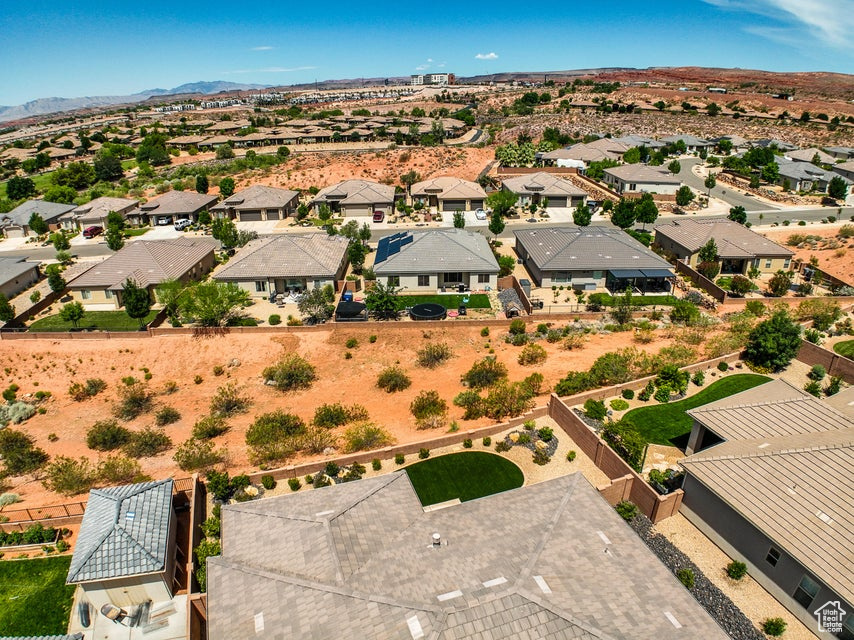 Aerial view of residential area featuring mountains