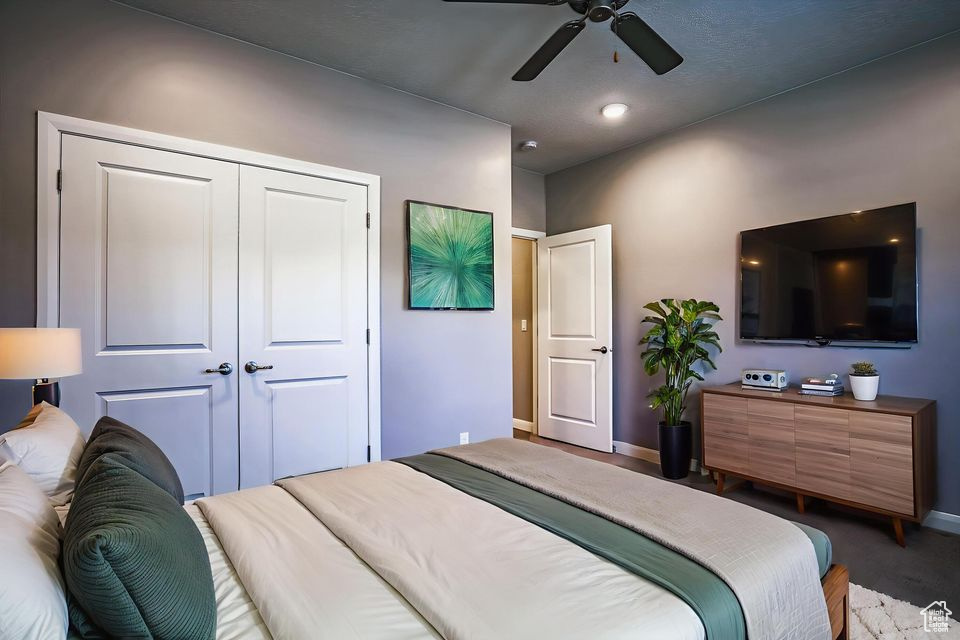 Bedroom featuring a closet, ceiling fan, and recessed lighting
