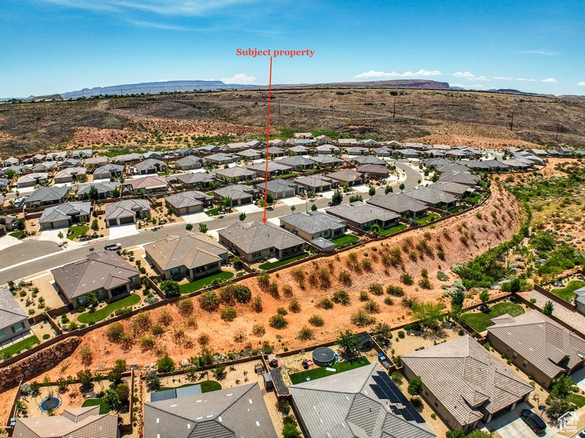 Aerial perspective of suburban area featuring mountains