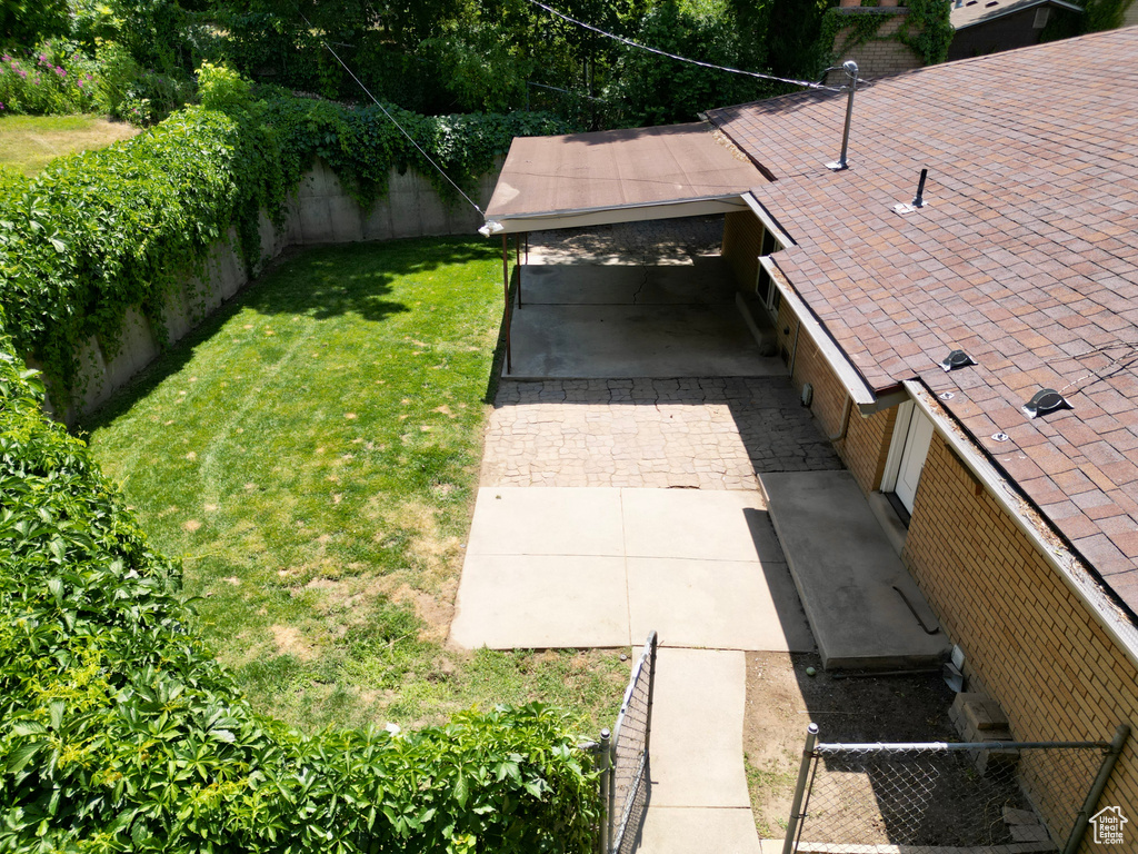 View of fenced backyard