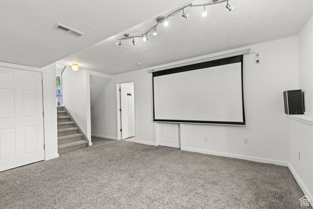 Carpeted cinema with baseboards