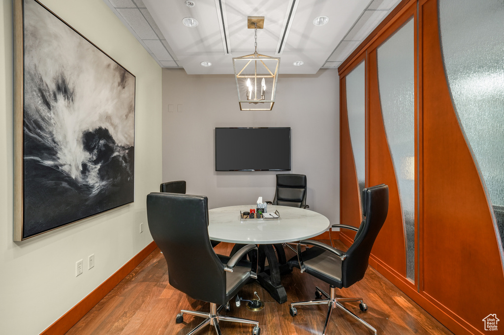 Office area featuring wood finished floors and baseboards
