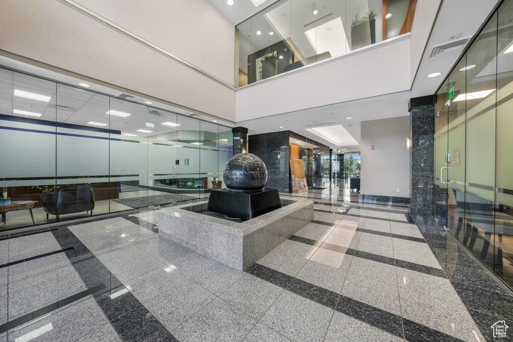 Common area featuring a towering ceiling
