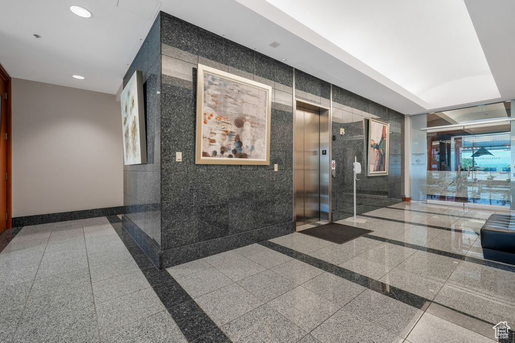Community lobby featuring recessed lighting
