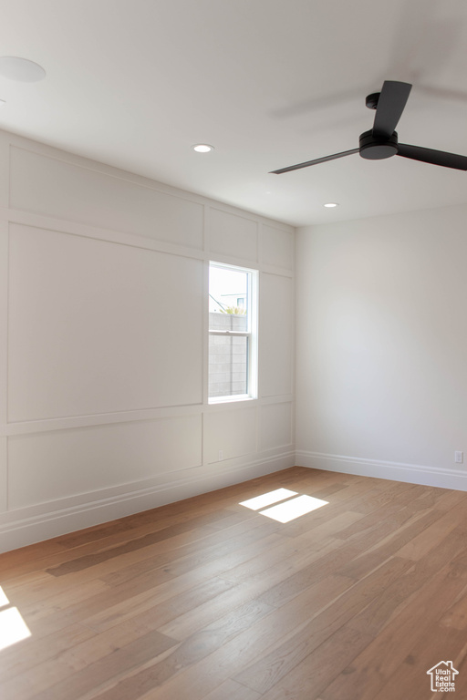 Unfurnished room with light wood-style floors, recessed lighting, and ceiling fan