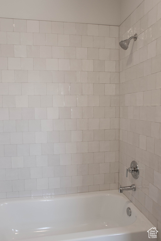 Full bath featuring shower / bathtub combination