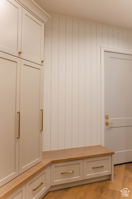Mudroom with light wood finished floors
