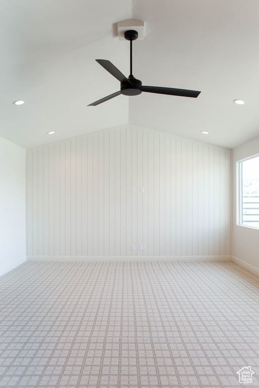 Empty room featuring ceiling fan, recessed lighting, and light colored carpet