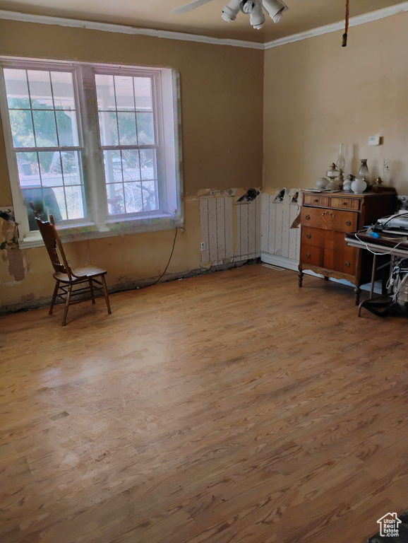 Miscellaneous room featuring crown molding, wood finished floors, and ceiling fan