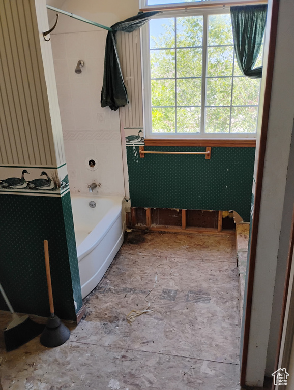 Full bathroom with shower / tub combination