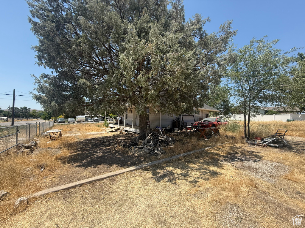 View of yard featuring a garage