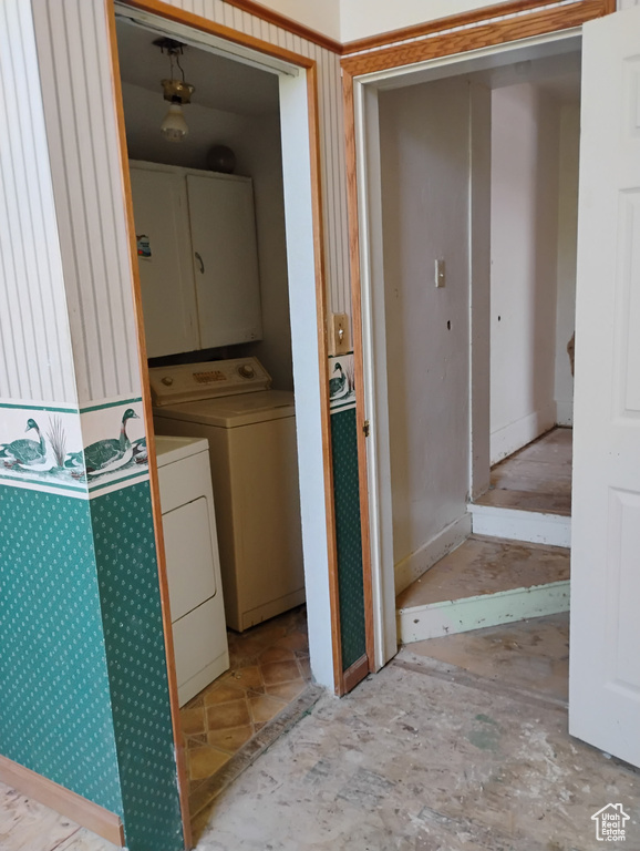Washroom featuring washer and clothes dryer