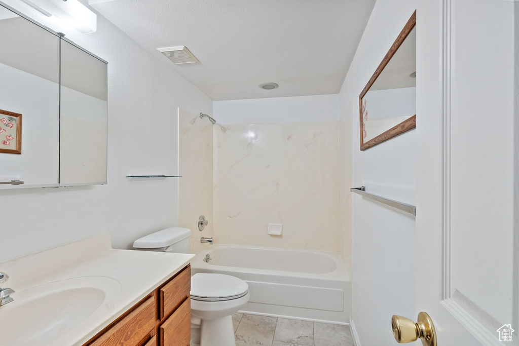 Full bathroom featuring vanity and shower / washtub combination