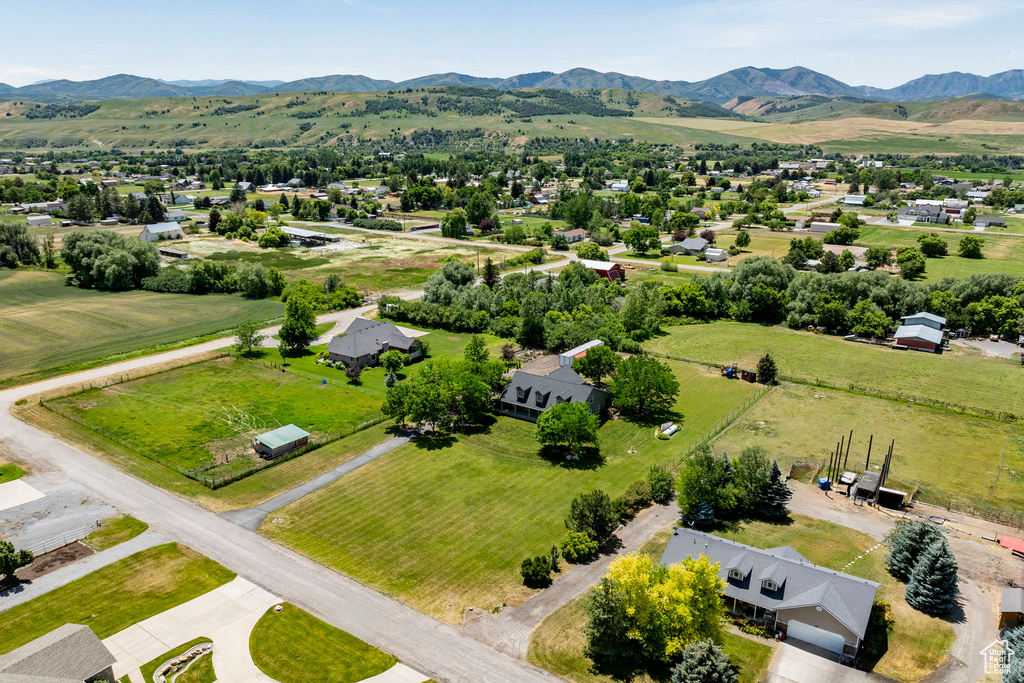 Aerial view of residential area featuring a mountain backdrop