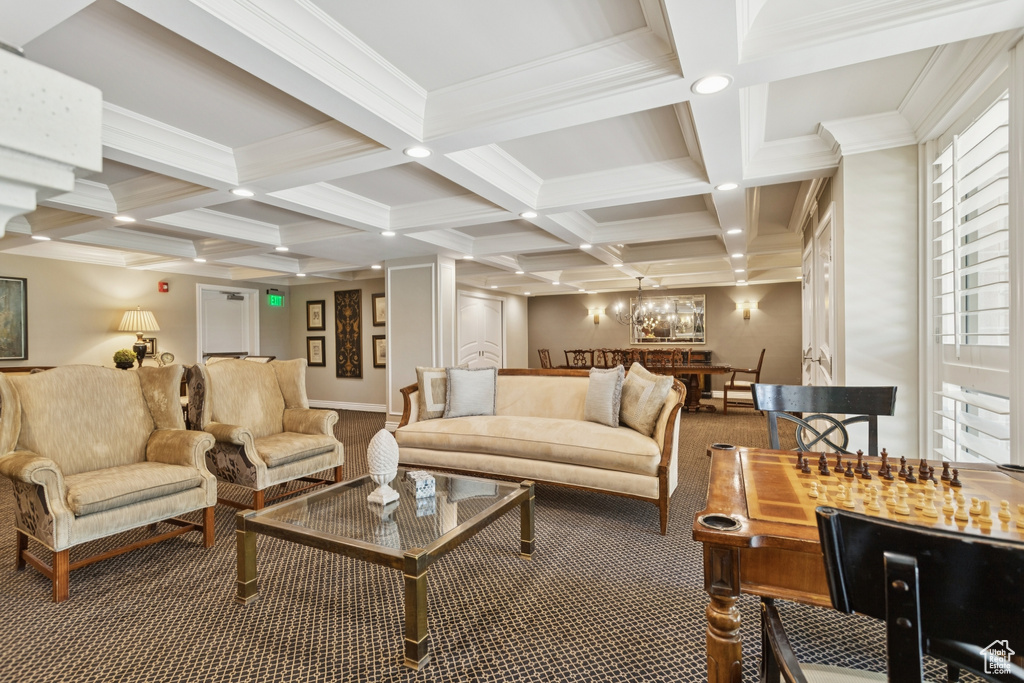 Building lobby featuring coffered ceiling, beam ceiling, crown molding, and recessed lighting