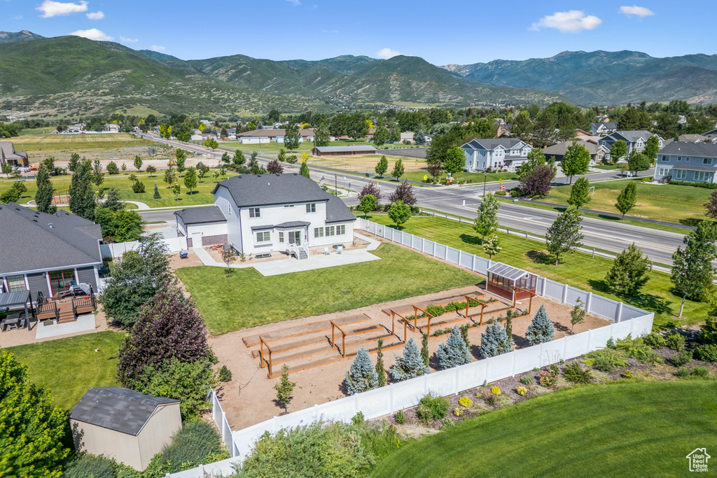 Aerial view of residential area with mountains