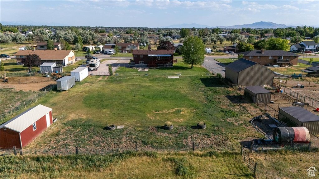 Aerial view of residential area with a mountain backdrop