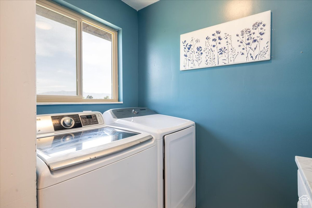 Laundry room with separate washer and dryer