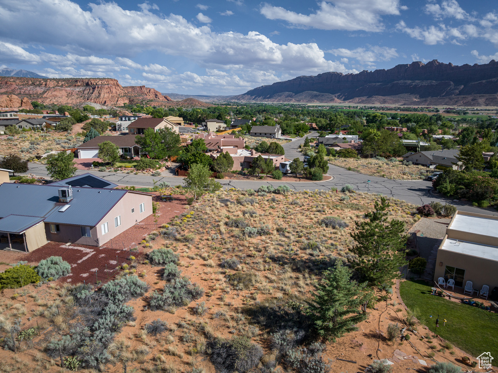 Aerial view of residential area with a mountainous background