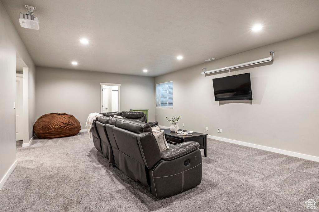 Living room with carpet and recessed lighting