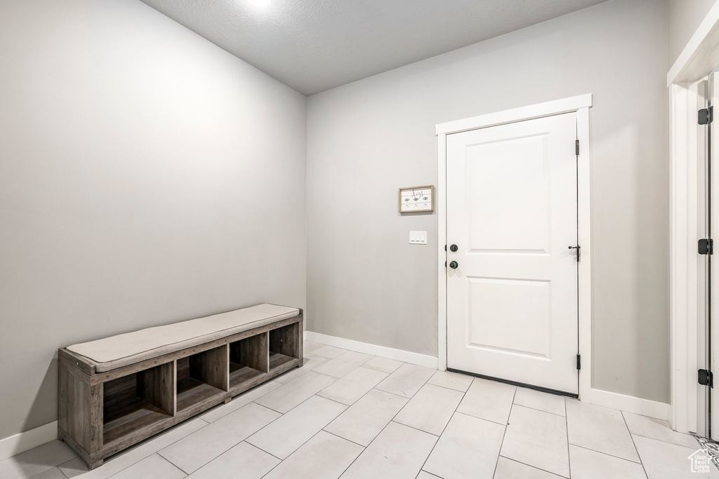 Mudroom featuring baseboards