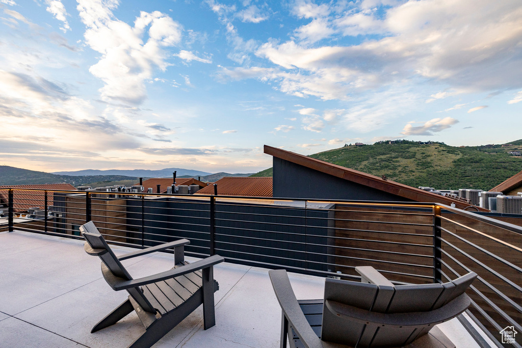 Patio / terrace featuring a mountain view