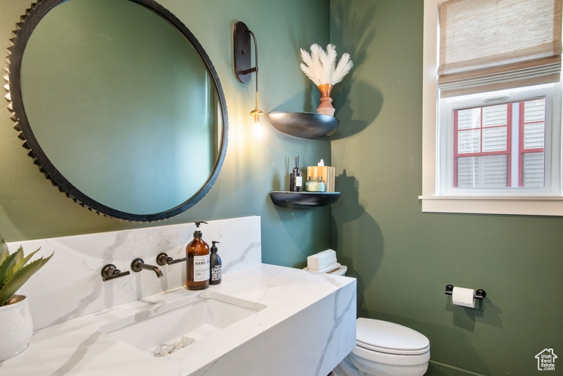 Bathroom with toilet and vanity