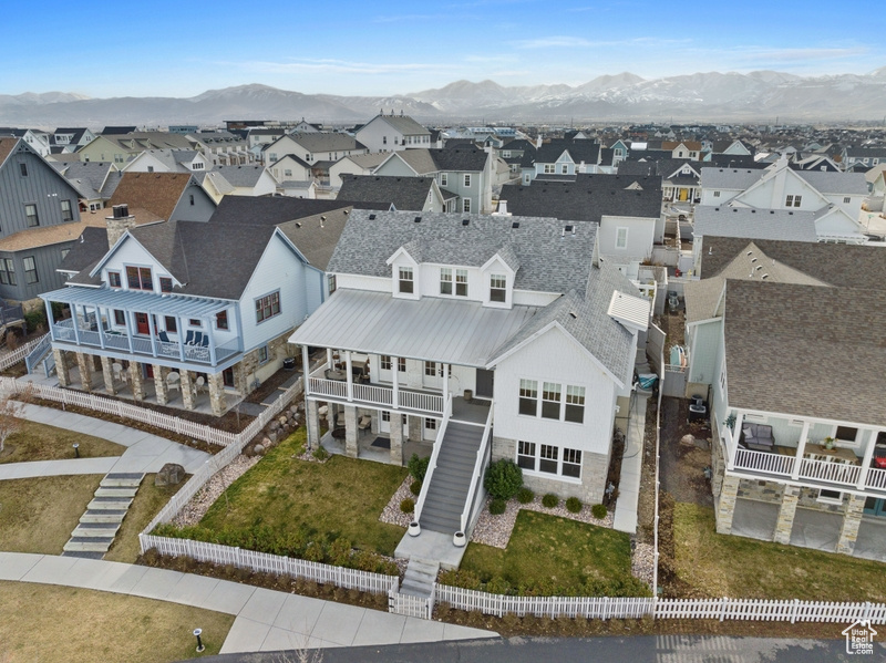 Aerial perspective of suburban area with a mountain backdrop