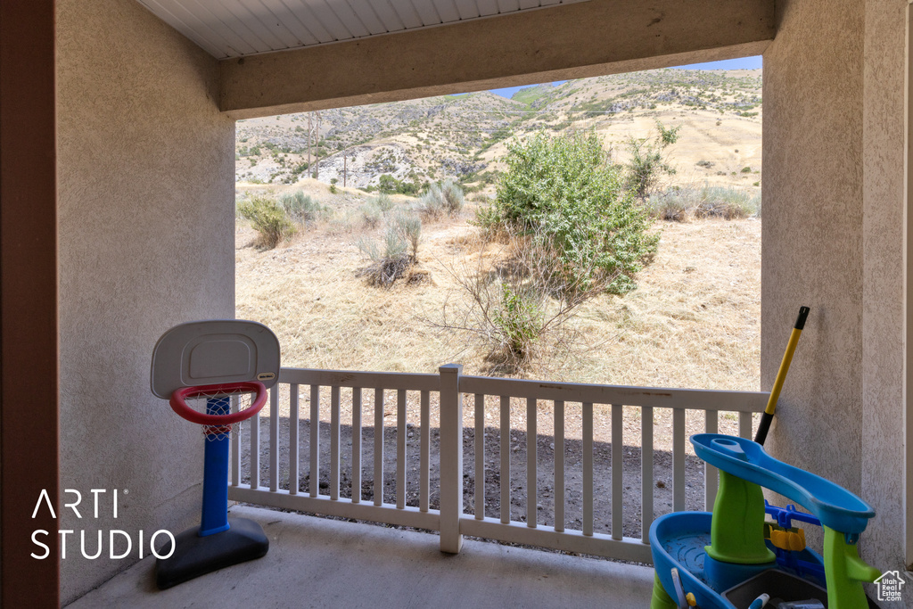 Patio / terrace featuring a mountain view