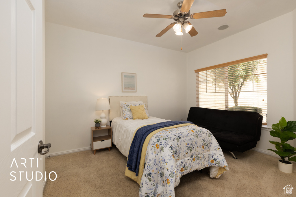 Bedroom with carpet flooring and ceiling fan