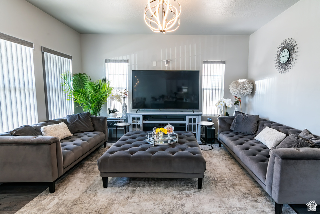 Living area featuring a chandelier