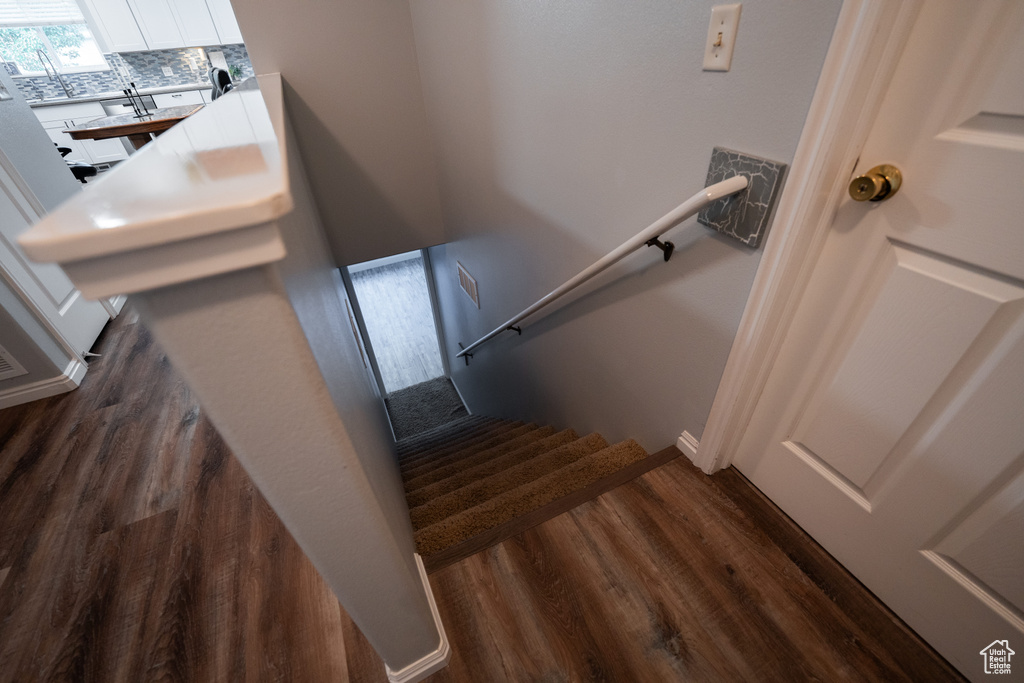 Stairway with wood finished floors