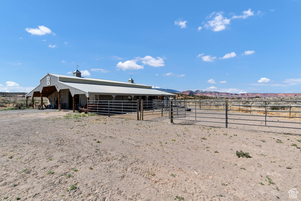 View of outdoor structure featuring an exterior structure and a mountain view