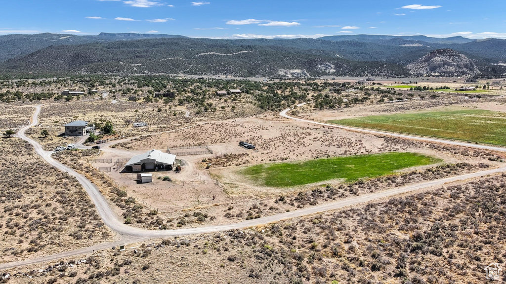 Aerial view of sparsely populated area with mountains