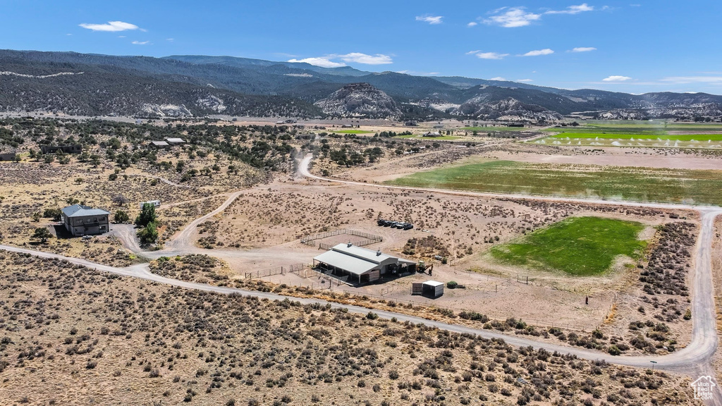 Aerial view of sparsely populated area featuring a mountainous background